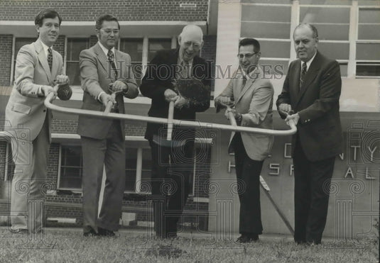 1973, Mayor Jim Haygood & Others Begin Digging for Hospital Addition - Historic Images
