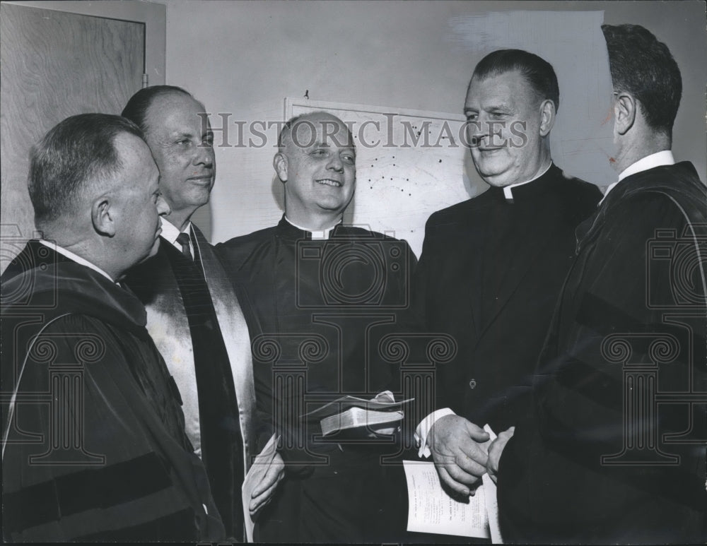 1966, Reverend Julian McPhillips with others listen to Bishop Hines - Historic Images