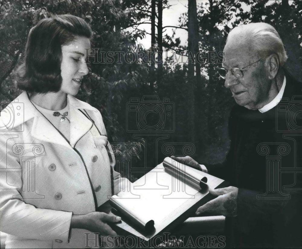 1969, Mrs. Royal Miree Jr., Father Patrick O&#39;Neill with scroll, AL - Historic Images