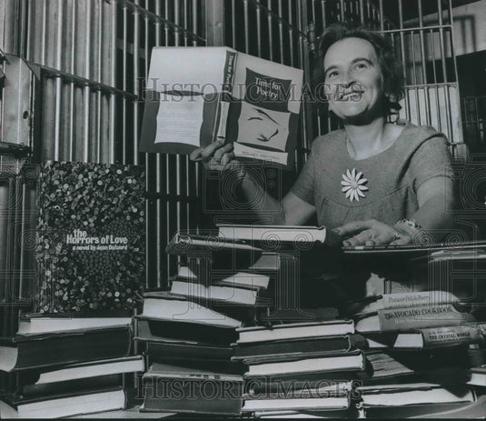 1968, Mrs. JF Ostergren with books stored at Vestavia Hills City Jail - Historic Images
