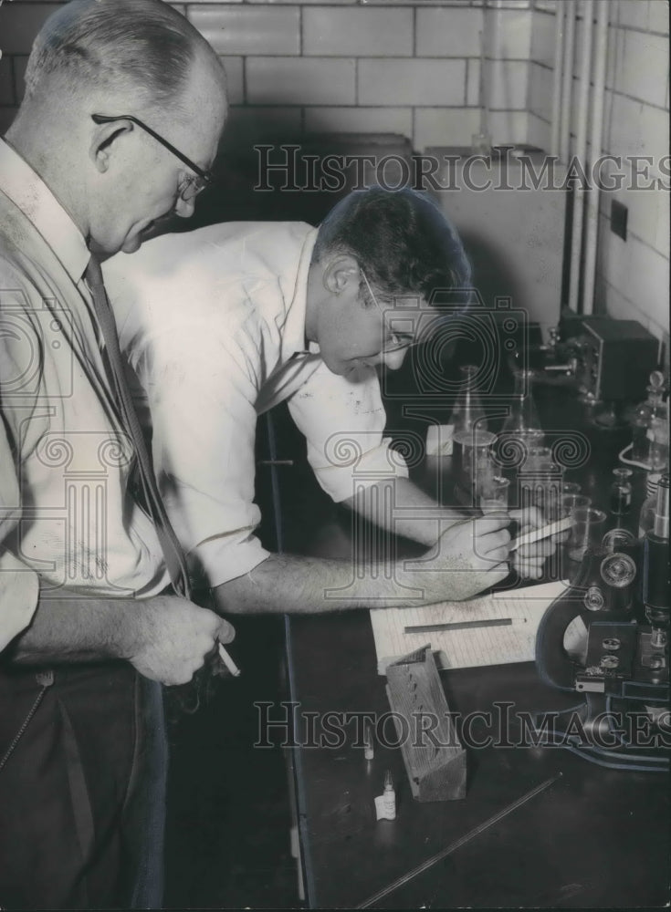 1954, Toxicologist &amp; chemist test evidence in Alva Knox disappearance - Historic Images