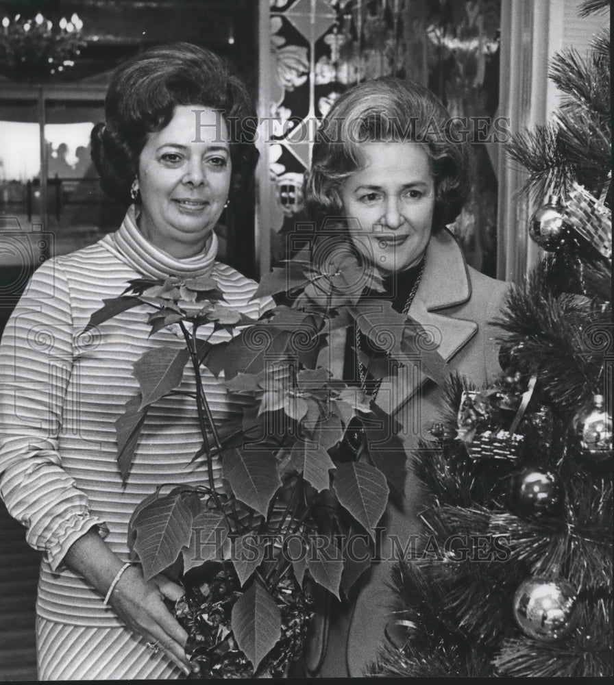 1977, Mrs Hearn &amp; Mrs Gentle Co-Chairman, Poinsetta Ball with plants - Historic Images