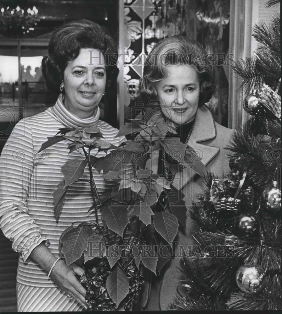 1977, Mrs Hearn & Mrs Gentle Co-Chairman, Poinsetta Ball with plants - Historic Images