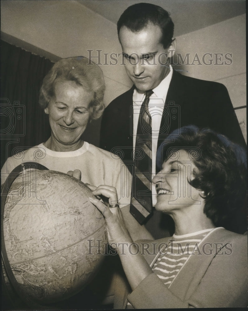 1969, Mrs. Blazena Mestecka with Others around world globe - Historic Images