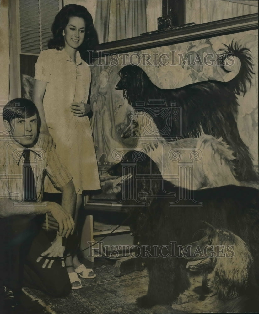 1975, Mr. and Mrs. Reed Proctor Councilwoman and husband with animals - Historic Images