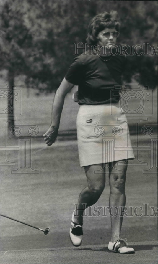 1975, Golfer Joann Prentice drops club after missing putt in game - Historic Images