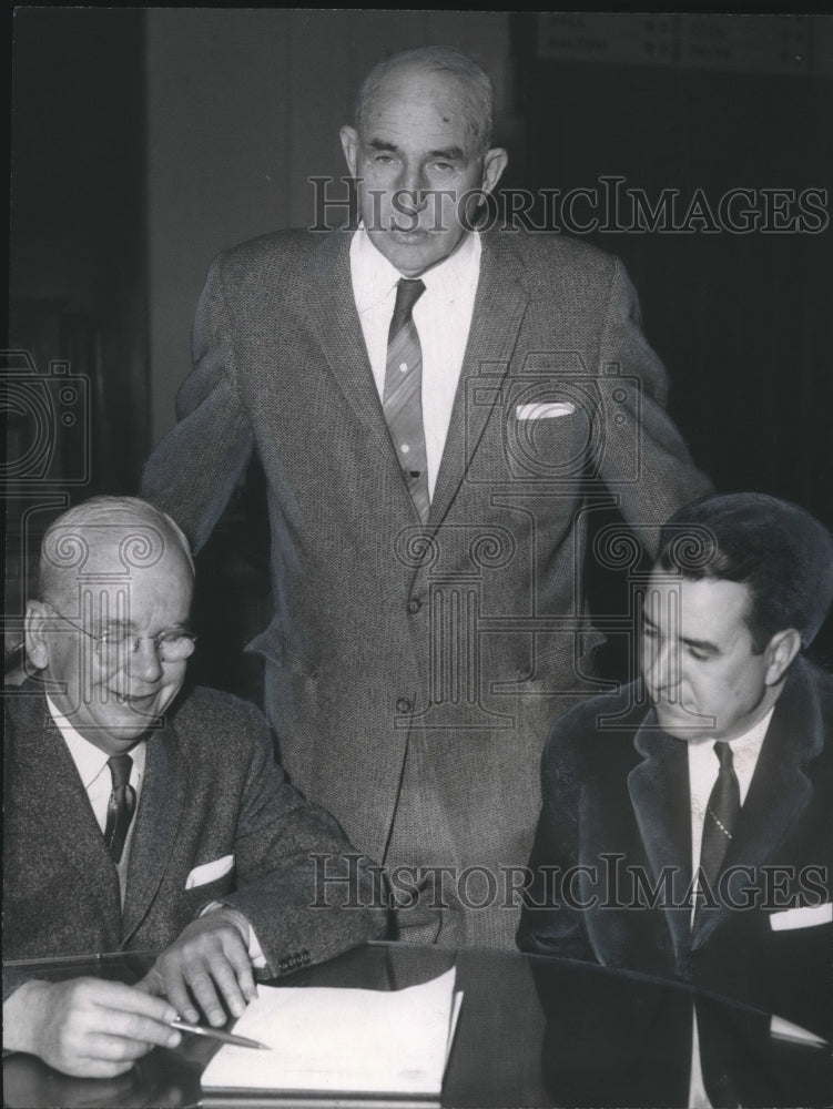 1958, Dr. Ralph Draughon, E. A. McBride, Dr. Frank A. Rose buy bonds - Historic Images