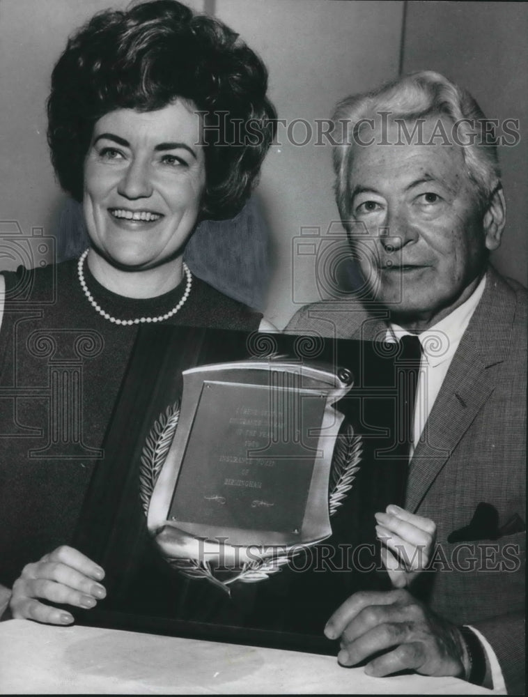 1969, Frank M. Lynch, Insurance Executive, awards Mrs. Lorene Sexton - Historic Images