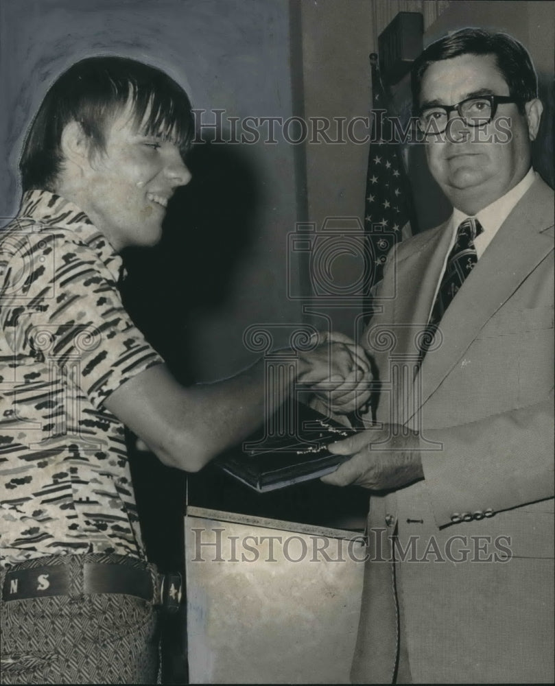 1975, Robert Van Bradley receives award by George Limbaugh - Historic Images