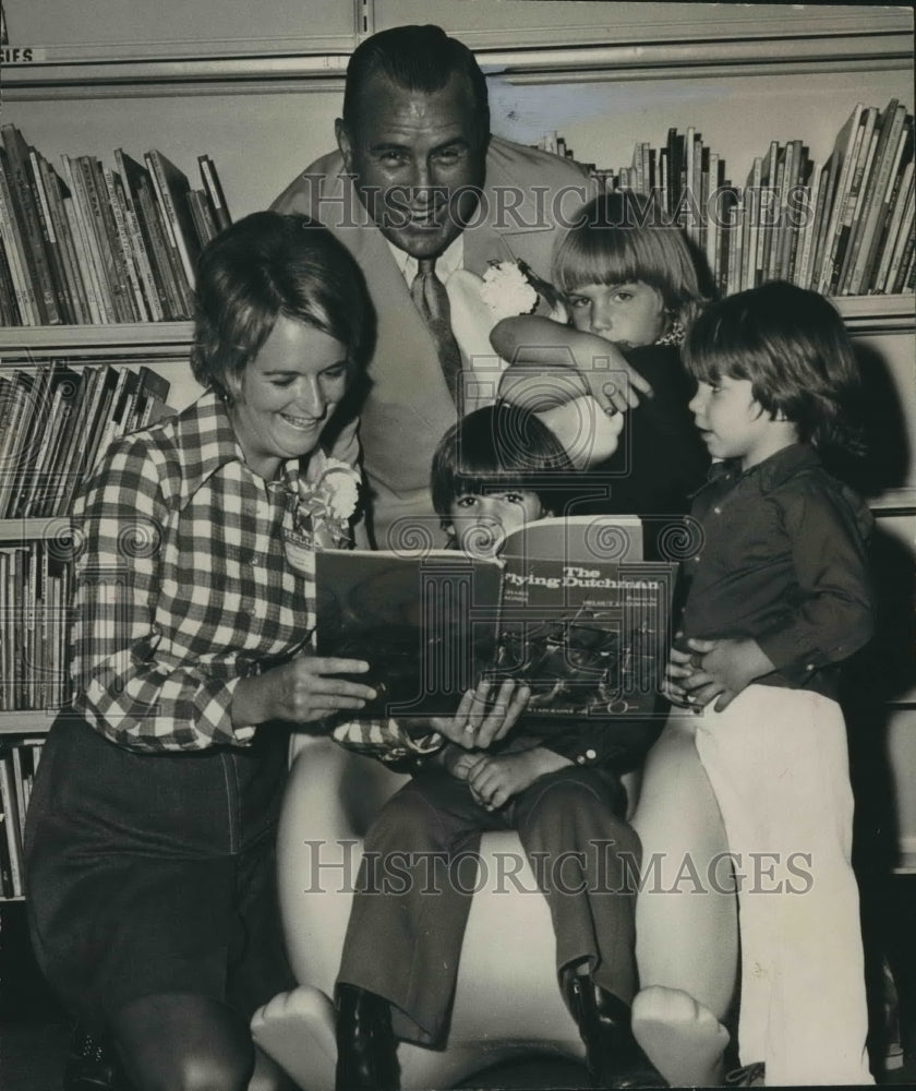 1973, William &quot;Bill&quot; Nichols with Mrs. Gallops reads story at Library - Historic Images