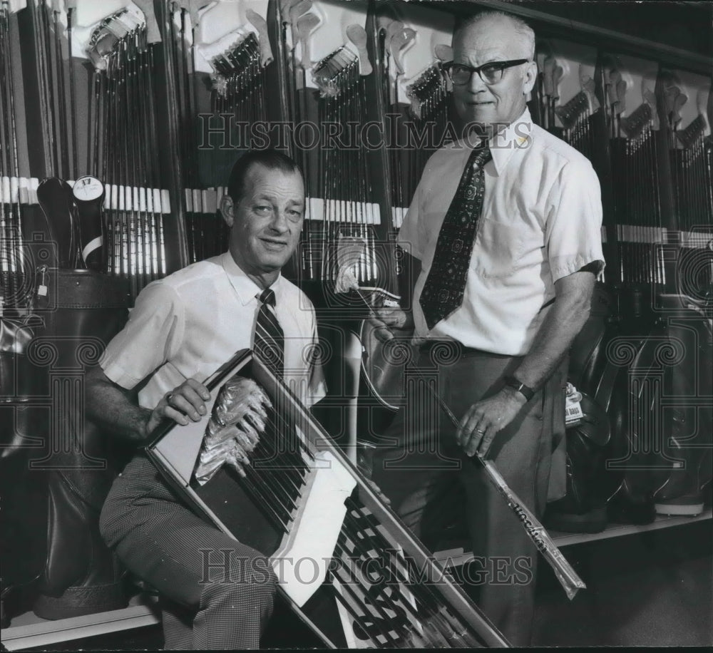 1973 Dixie Sporting Goods: Cecil Martin, Al Jones with golf clubs-Historic Images