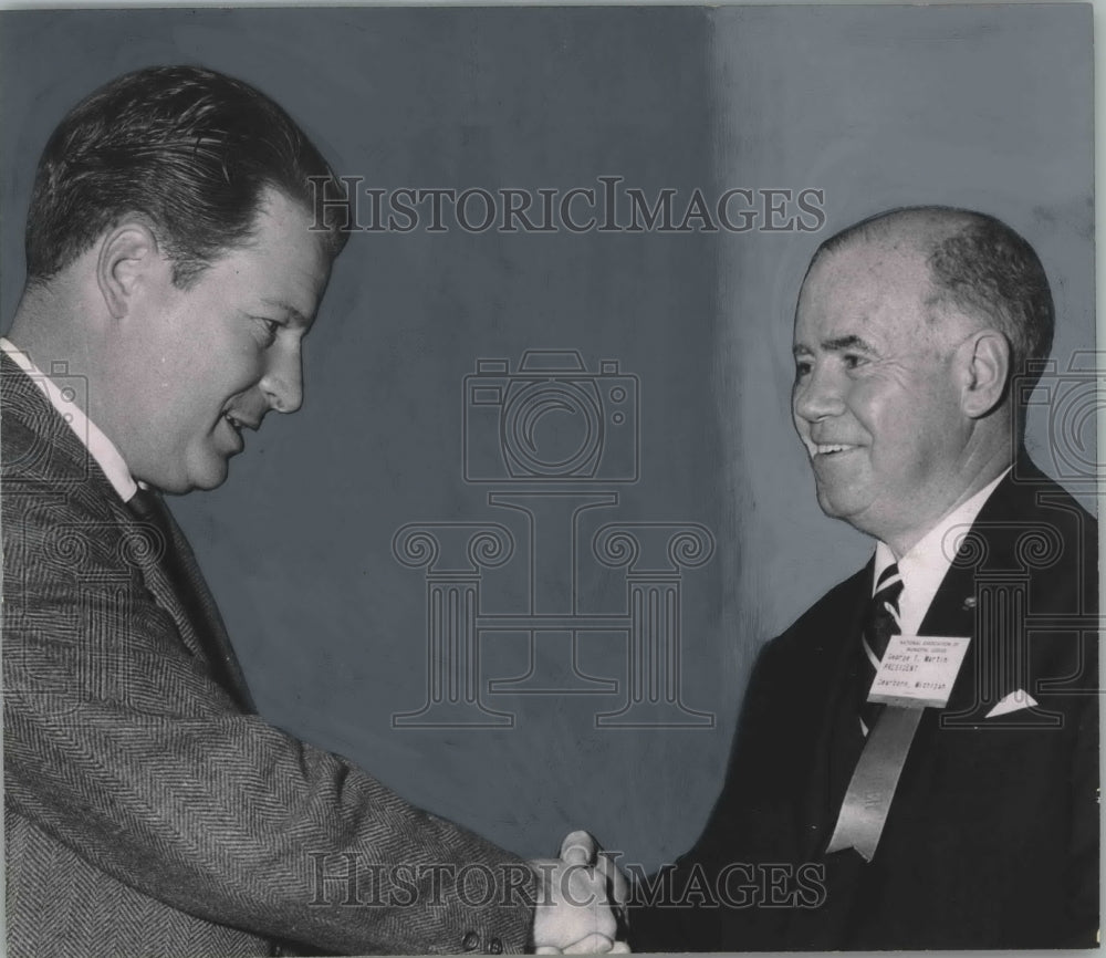 1965, Judge J. Earl Langner congratulated by George T. Martin - Historic Images