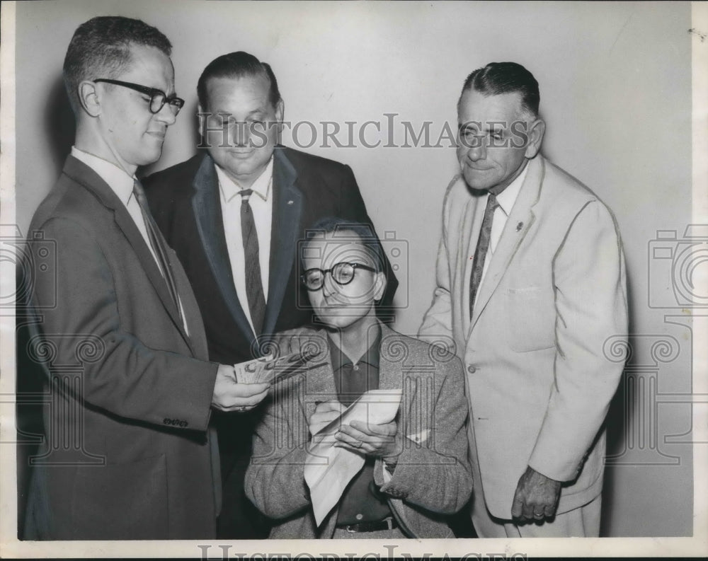 1959, F. M. McDowell, Dr. Arthur K. Black, Others with game tickets - Historic Images