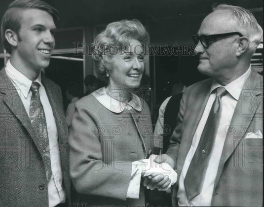 1970, Gail Patrick (Jackson) & Son, Tom, greet Charles Bodden - Historic Images