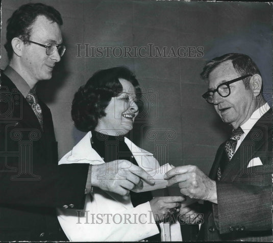 1974, John Jones, former Bessemer, AL news reporter with man & woman - Historic Images
