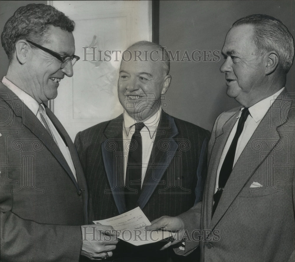 Press Photo Allan A. Johnson, Coca-Cola, donates check to help rebuild JonesHigh - Historic Images