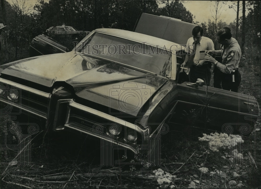 1972, Authorities exam car following bank robbery, Phenix City, AL - Historic Images