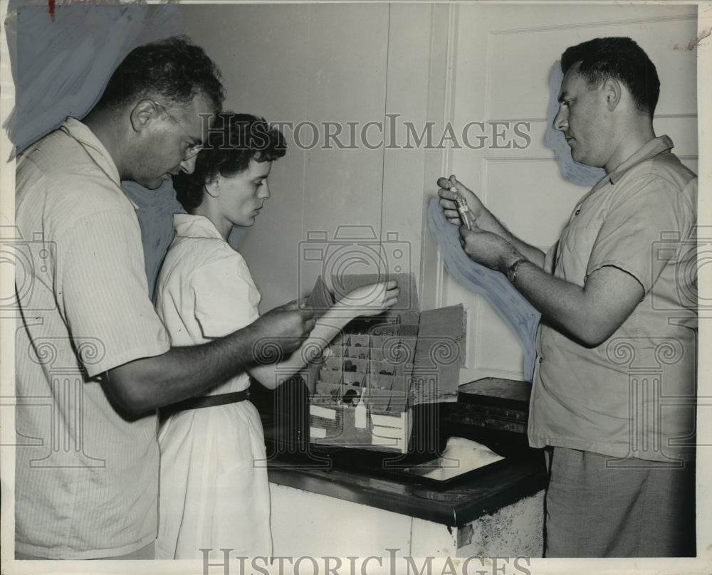 1953 Doctors Look at Gamma Globulin Tests, Montgomery, Alabama - Historic Images