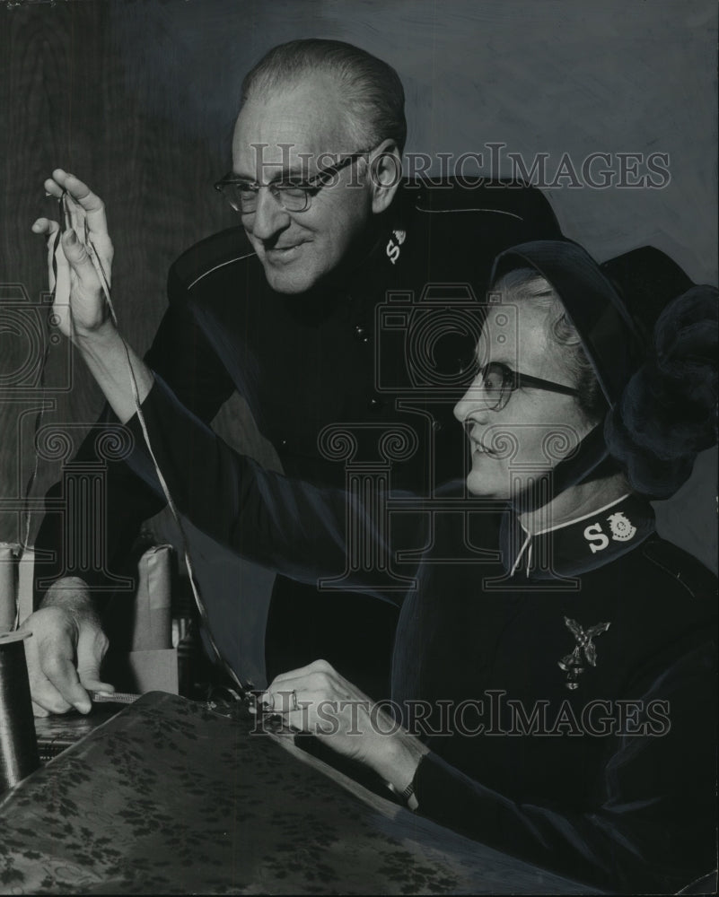 1963, Salvation Army Lieutenant Colonel & Mrs. Longino Wrap Gifts - Historic Images