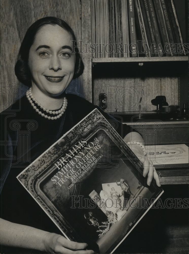 1959, Mrs. Alex Lacy holding Brahms Symphonic No. 3 record album - Historic Images