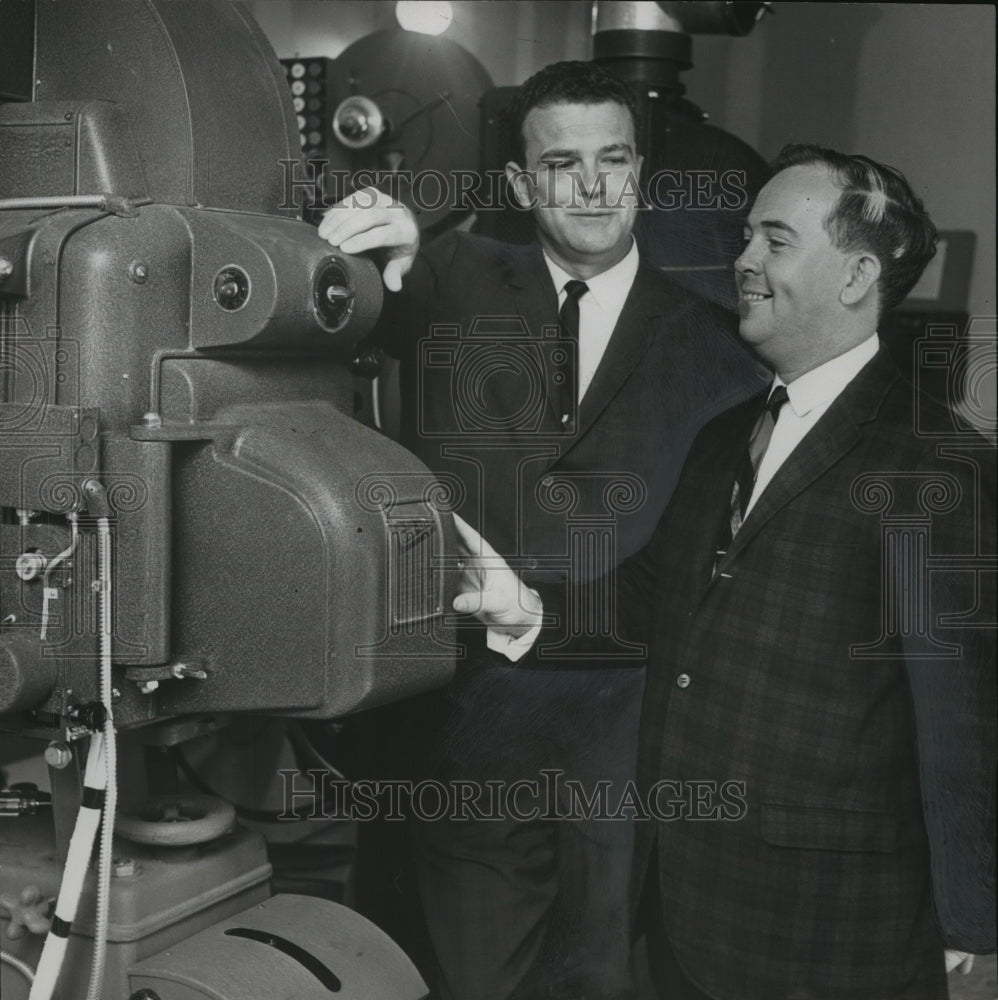 1966 Cecil McGlohon, M.D. Kent in front of movie projector - Historic Images