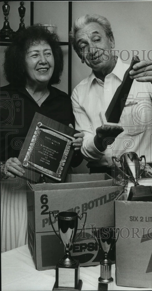 1981, Sadie and Chester Corson packing awards, Mountain Brook, AL - Historic Images