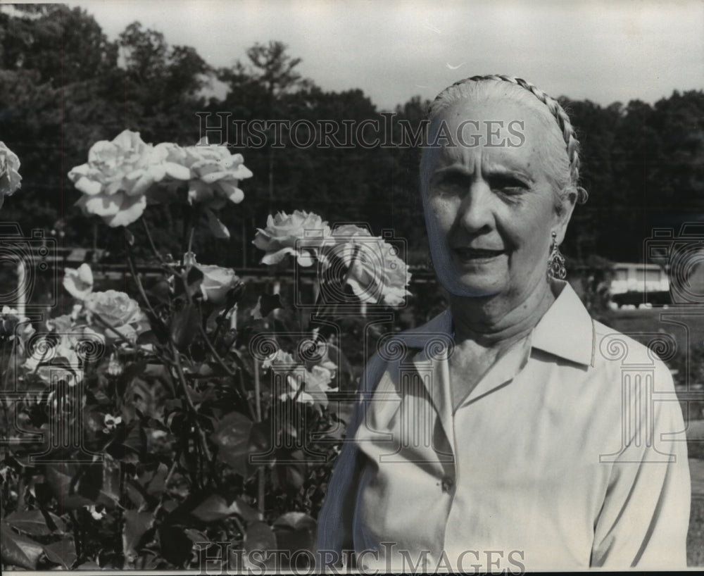 1977, Mrs. Walter E. Thompson In front of Flowers - abno09992 - Historic Images