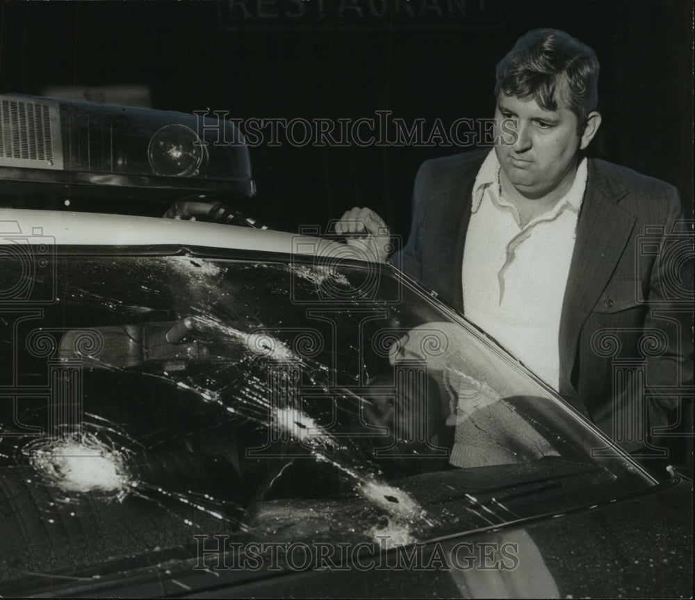 1973, Donald Todd with bullet shattered windshield - abno10025 - Historic Images