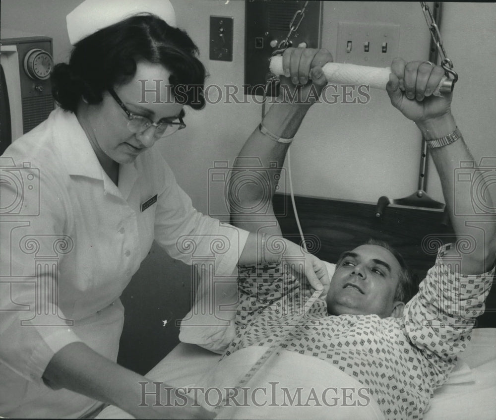 1966, Nurse Nelle Jackson Measures Dr. Carl Robinson for a Brace - Historic Images