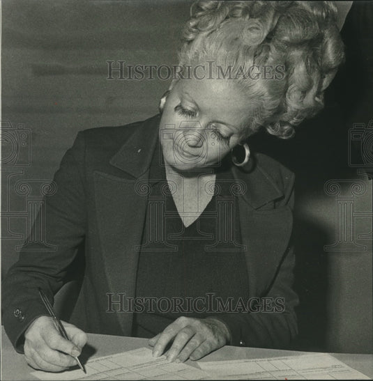 1976, Mrs. Milene Stevenson Signs Fingerprint Card When Arrested - Historic Images