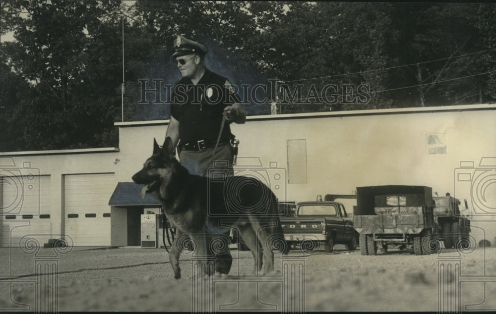 1971, Private guard watches public works building in Alabama - Historic Images