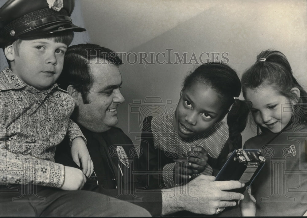 1976, Officer Ted Trammell with kids in Birmingham Alabama - Historic Images