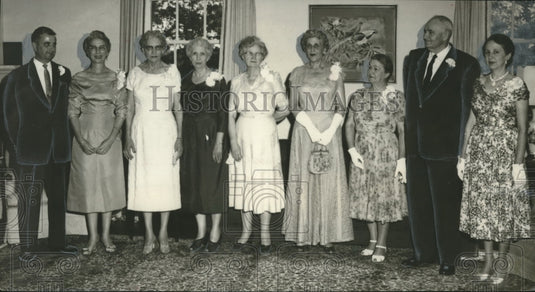 1958, Dr. & Mrs. Howard M. Phillips & others at tea, Montevallo, AL - Historic Images