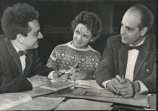 1962, Directors and Soloist of "Gianni Schicchi" Discuss Plans - Historic Images