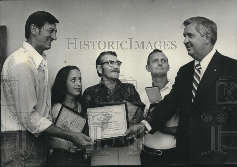 1977, James Parsons presenting certificates to others - abno10838 - Historic Images