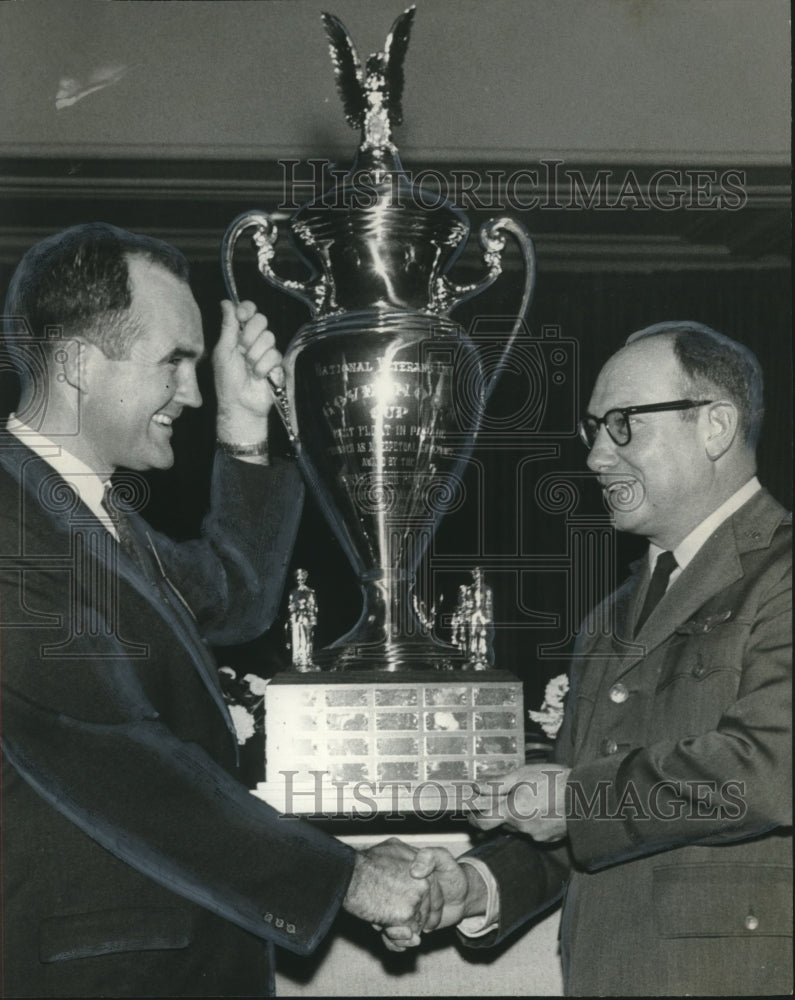 1959, Dr. Ed Speed Receives Governor's Trophy for Veteran's Day Float - Historic Images