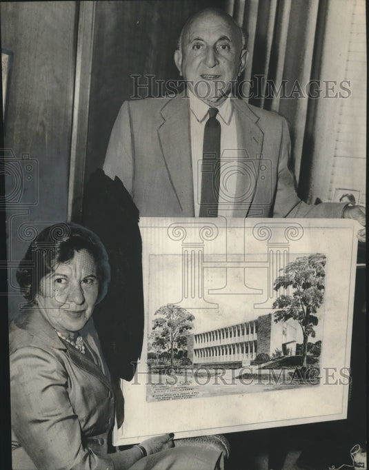1960, Merchant Joe Smolian and Wife Hold Architectural Drawing - Historic Images
