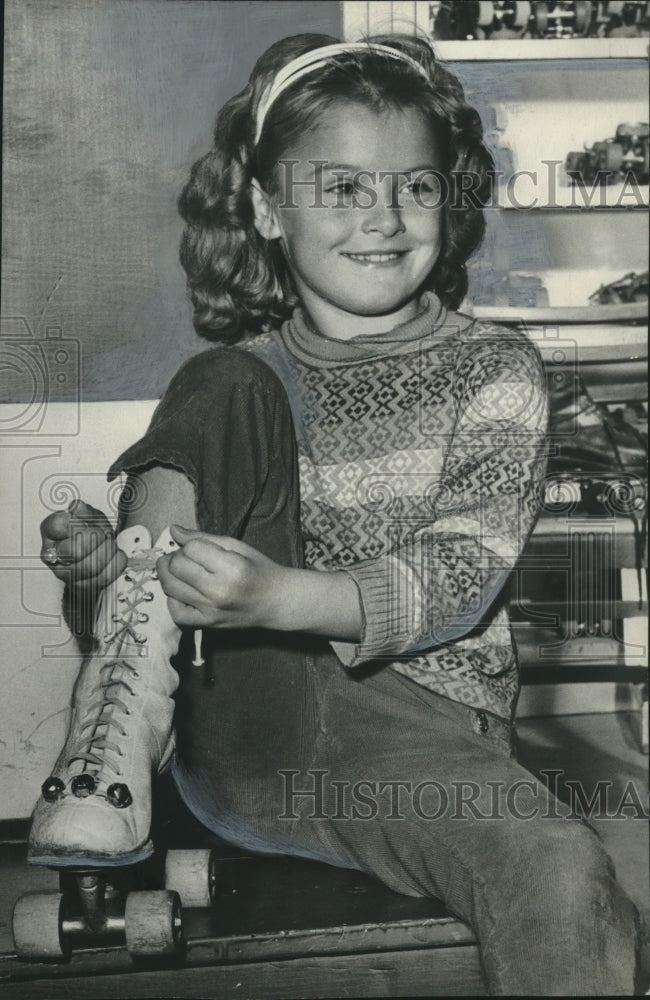 1962, Little girl lacing skate, Methodist Children&#39;s Home, Selma, AL - Historic Images