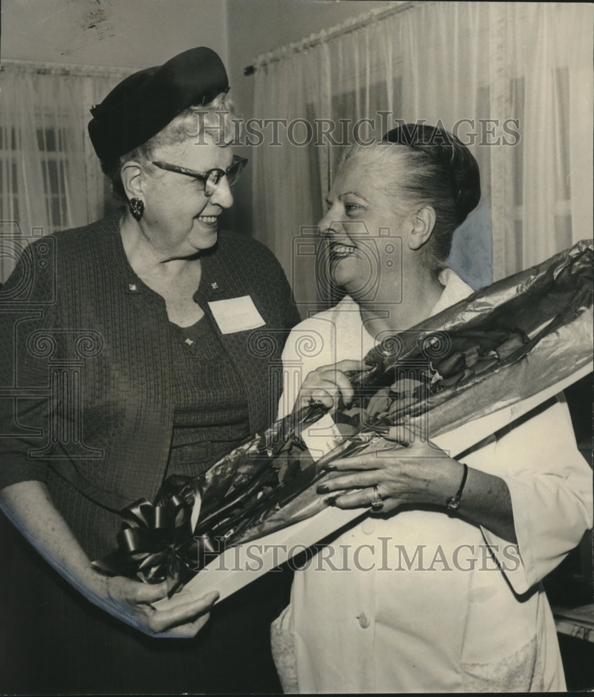 1966, Julia Townsend receives roses from Louise Mashburn - abno11081 - Historic Images