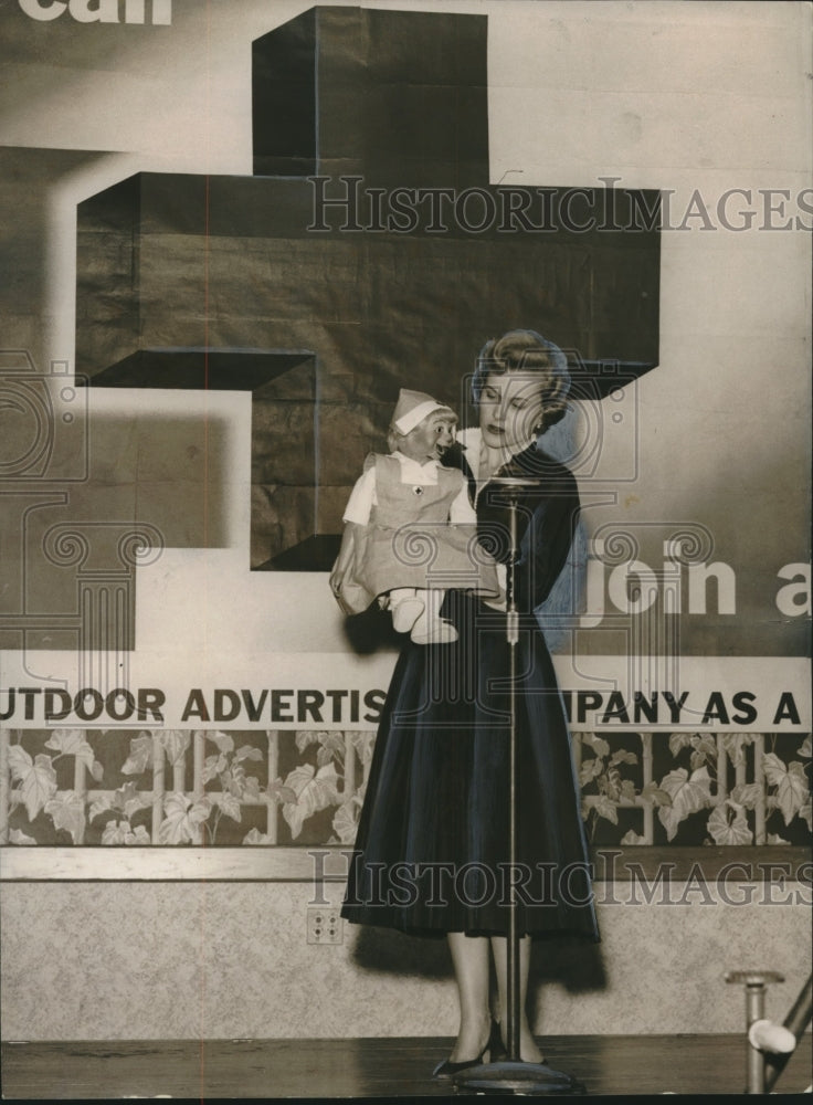 1955, Marilyn Tate, and her puppet, Emma Lou, at American Red Cross - Historic Images