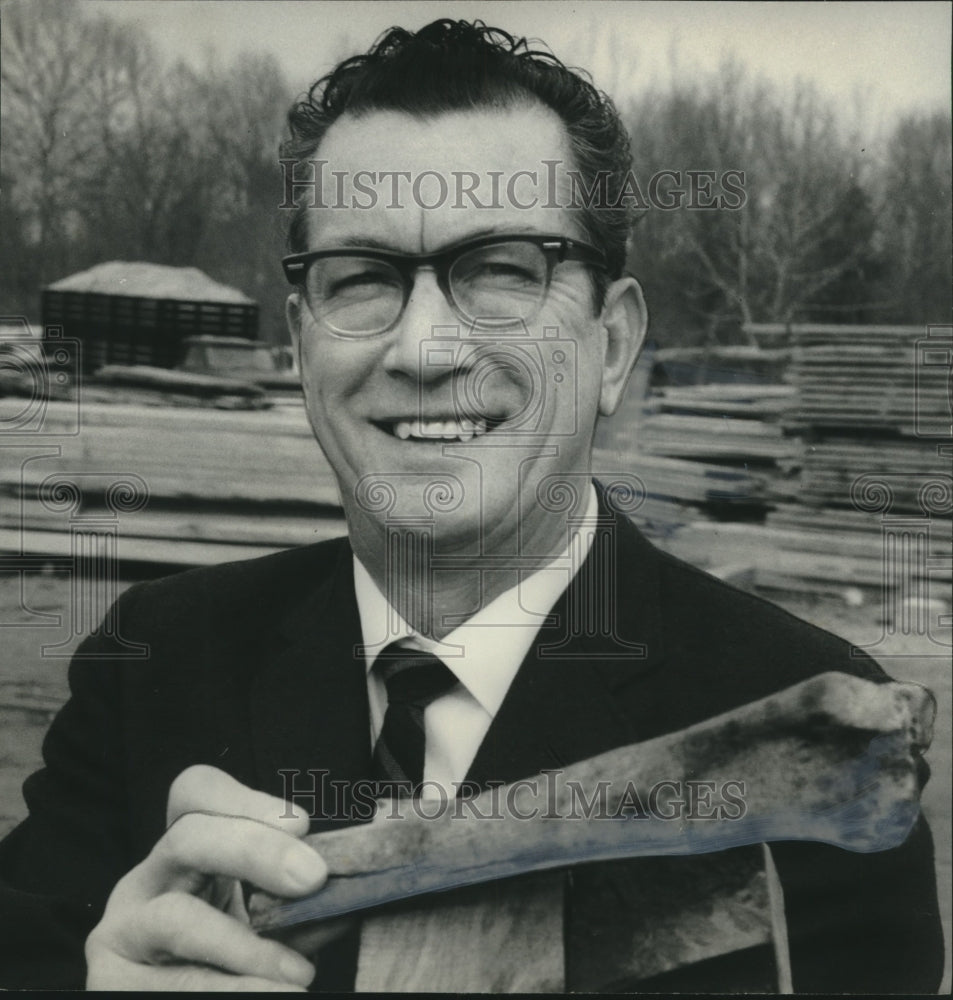 1969 Bruce Talley, Manager, H. L. Johnson Lumber Shows Bone Found - Historic Images