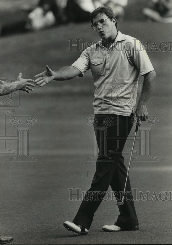 1982 Alabama-Golfer Ricky Beck shakes hands after Alabama Open title - Historic Images