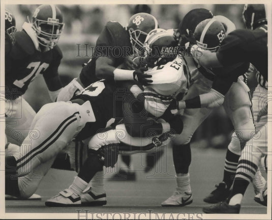 1987 Press Photo Alabama players gang tackles Southern Miss. player. - abns01673- Historic Images