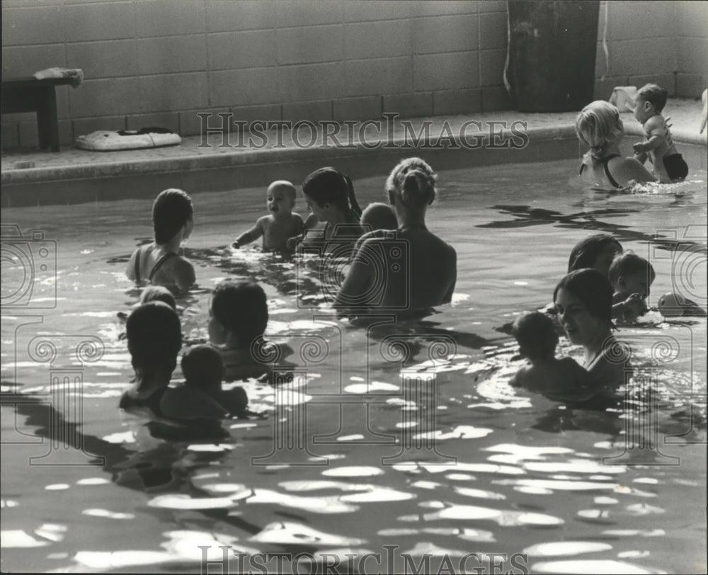 1980 Young Babies Learning To Swim In Pool Under Close Supervision - Historic Images