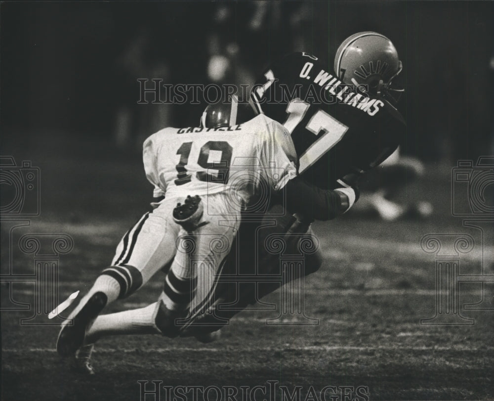 1982 Jeremiah Castille Tackles Football Carrier Oliver Williams - Historic Images