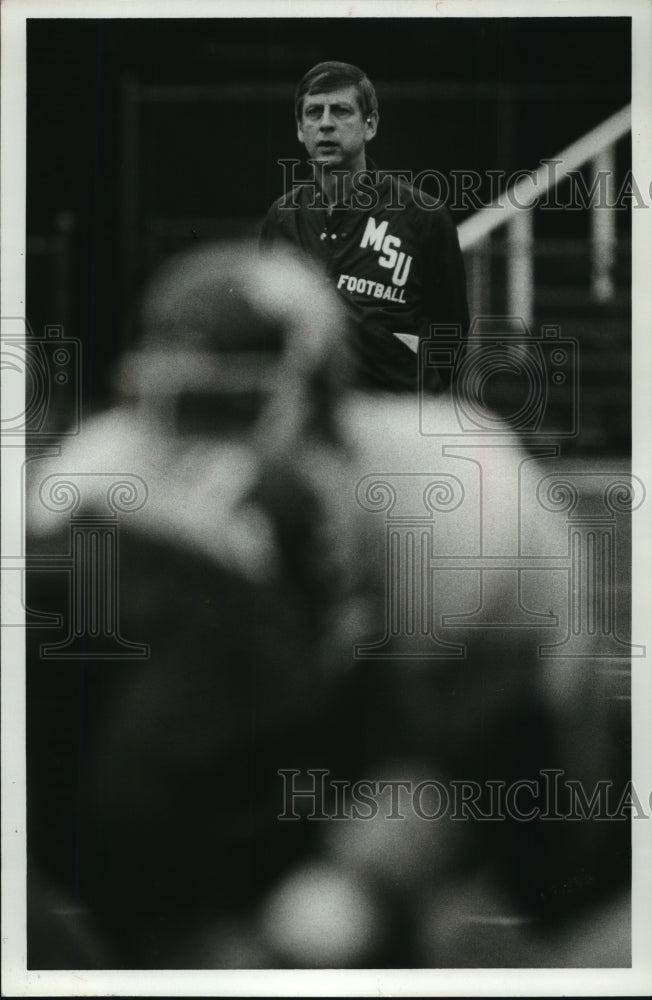 1981 Coach Doug Barfield oversees workout at Legion Field - Historic Images