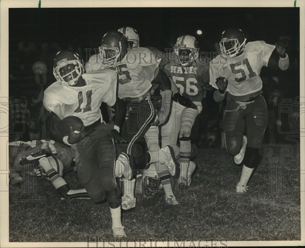 1985 Press Photo Phillips versus Hayes High School Football Players at Fair Park - Historic Images
