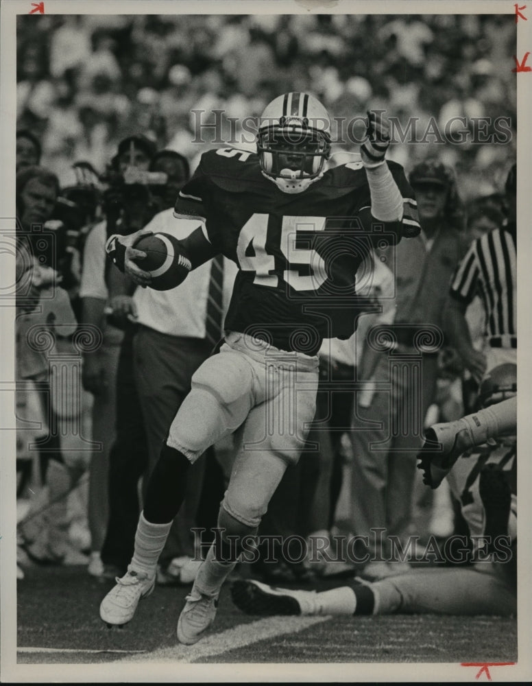 1985 Press Photo Auburn Player Jimmie Warren Intercepts Florida State Pass- Historic Images