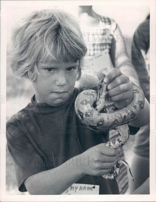1972 Florida Camp Seminole Andrew Tellone Ties Bow with Boa Press Photo - Historic Images