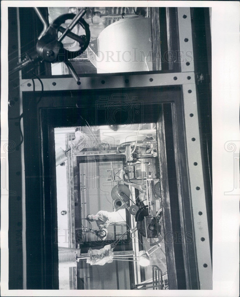 1957 A.T. Jacobsen Testing Irradiated Food Inside a Chamber Press Photo - Historic Images